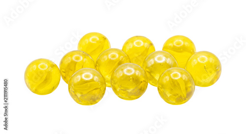 Canvastavla A collection of translucent yellow marbles arranged in a playful cluster