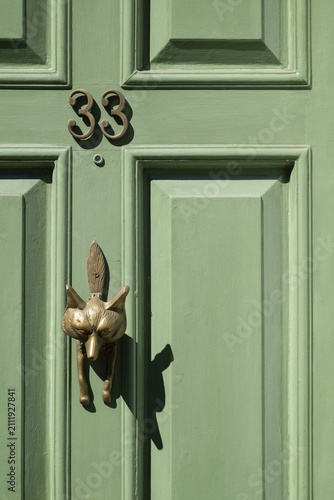 Light green, coffered door with fox shaped brass door knocker and house number 33, Chelsea, London, Great Britain, England, Great Britain