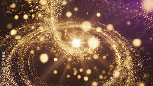 Shimmering golden glitter spiral vortex on a dark background