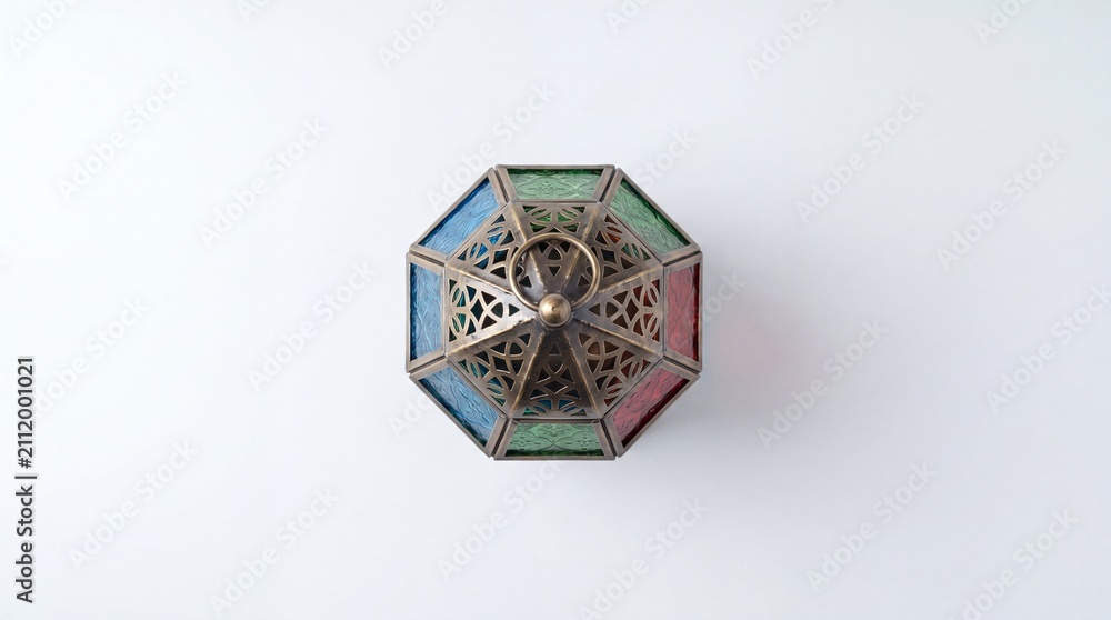 Fototapeta premium Handcrafted Ramadan lantern glowing with intricate patterns. Traditional festive Fanoos decoration for Islamic celebrations and home decor.