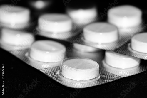 Obraz na plátně A blister pack of white paracetamol pills tablets with isolated on a neutral bac