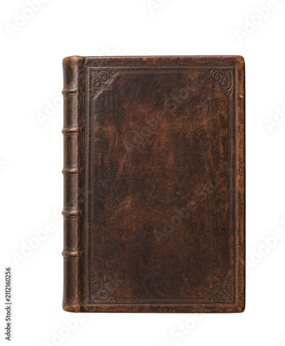Fotografie Antique leather bound book with ornate embossed cover and raised spine details