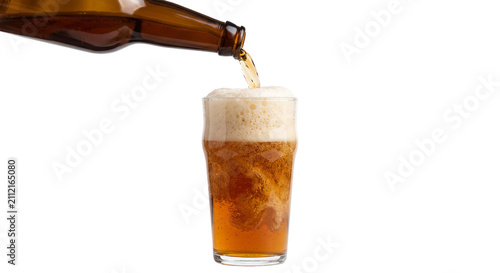 Obraz na plátně Amber beer being poured into a glass creating a frothy head