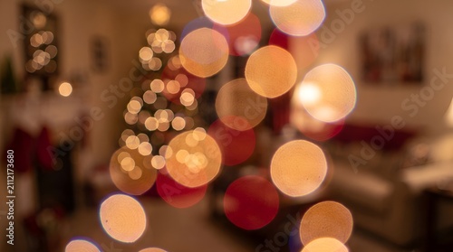 Warm Cozy Christmas Room Background with Glowing Christmas Tree Bokeh Lights at Night