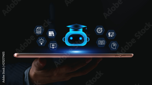 Hand holding a tablet displaying a glowing blue AI robot with a graduation cap. Artificial intelligence in education, smart machine learning, and digital EdTech concepts on a dark background.