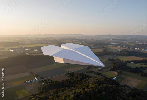 White paper airplane flying...