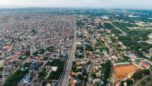 Fotografie Aerial of Accra Ghana city infrastructure dividing dense residential areas and p