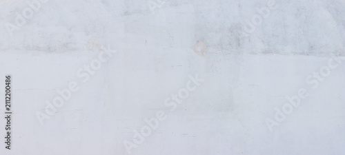 Bild auf Leinwand Minimalist off-white painted concrete wall background featuring subtle scratches, faint stains, and soft texture, providing a clean surface for graphic designs and overlays