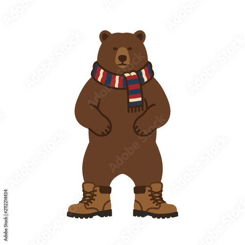 A cute brown bear wearing a colorful striped scarf and winter boots