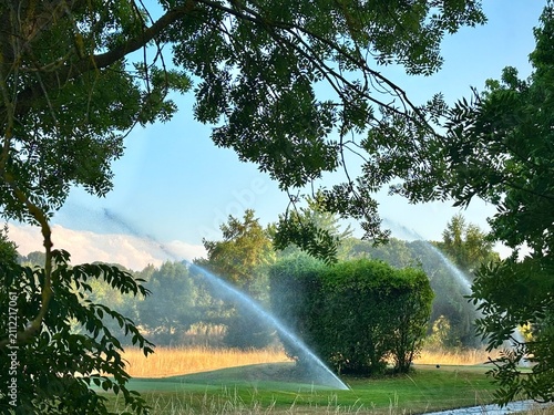 golf course maintenance watering the grass	
