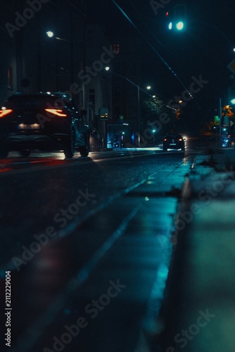 Canvas Print Rainy Night City Street with Neon Lights and Cinematic Atmosphere