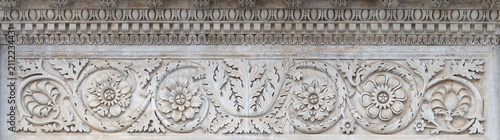 Tableau sur toile Lucca - The detail from medieval main portal of the church Chiesa di Santa Maria Fortisportam by local workroom from 12