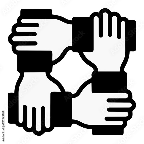 Four hands holding each other in a circle showing teamwork and corporate unity with strong contrast