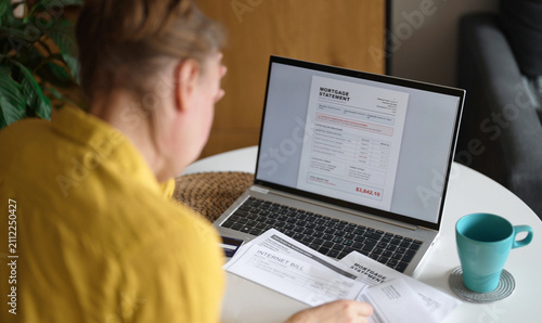 Fotografi Stressed woman having financial problems with paying bills.