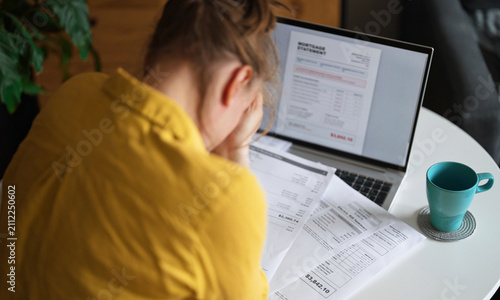 Quadro su tela Stressed woman having financial problems with paying bills.