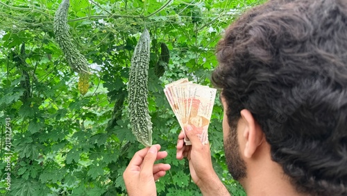 Konstfotografi A fan of Pakistani 5000 Rupee currency notes, the highest denomination banknote currently in circulation in Pakistan, symbolizing financial value and economic significance