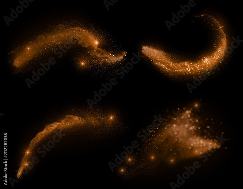 Set of four glowing golden magical stardust particle swishes isolated on black background with particles stardust sparkles abstract mystical firework isolated