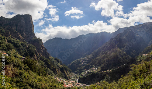 panoramic view of the valley of the nuns madeira from curral das freiras towards the hotel and viewpoint at eira do serrado sunny day no people