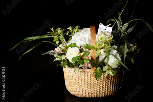 Flower arrangement on the table, flower basket