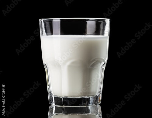 clear glass filled with white milk against black background liquid drink isolated on white background transparent