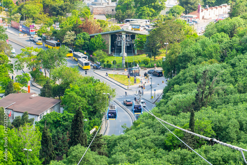 Aerial view of Eyüp Pierre Loti cable car line with city traffic and green trees in İstanbul, Turkey