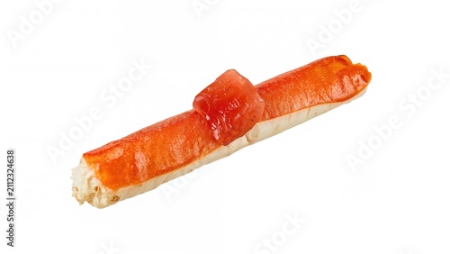 A piece of sushi with crab stick and a small tomato topping on a white background