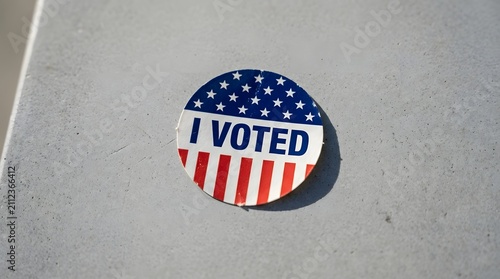 I voted sticker on a grey concrete surface