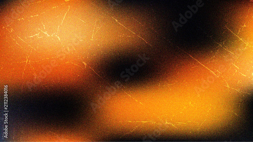 Abstract image featuring warm orange and yellow light leaks, creating a visually captivating texture.