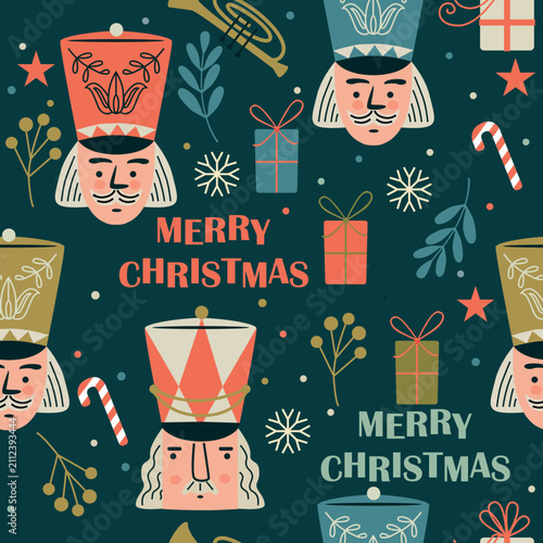 Christmas-themed repeating pattern on a dark teal background. It features several nutcracker soldiers wearing tall decorative hats, along with wrapped Christmas presents, candy canes, stars, snowflake