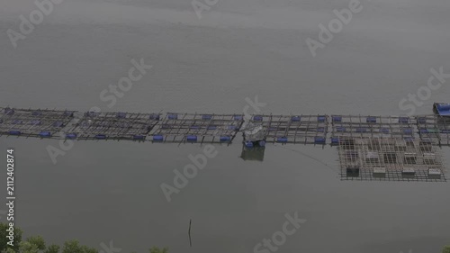 Aerial drone view of oyster farming rafts on the river in Long Son, near Ho Chi Minh City, Vietnam.