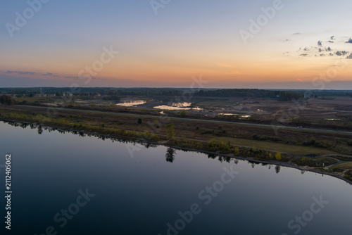 Aerial view tranquil Crandell lake reflecting twilight sky