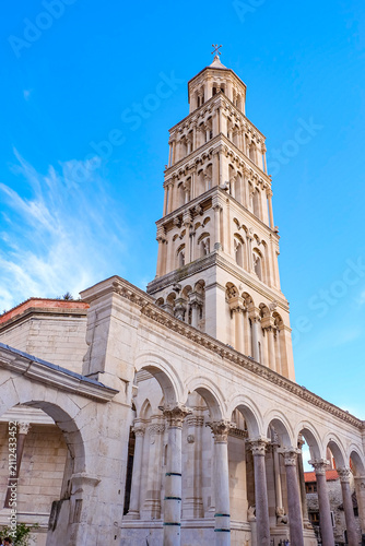 Fotografie Closeup and detail zoom in of the Romanesque bell tower of the Cathedral of Sain