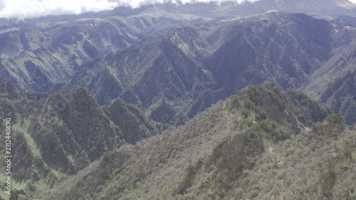 A drone video of the Caucasus Mountains, the Dzhily‑Su Valley, and the Pkhia Pass, Arkhyz, Russia, 2026.

