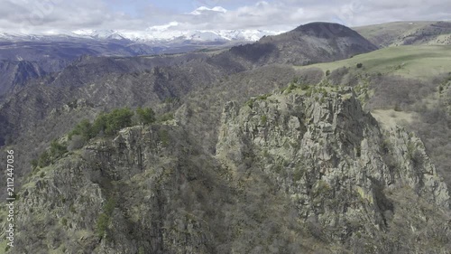 A drone video of the Caucasus Mountains, the Dzhily‑Su Valley, and the Pkhia Pass, Arkhyz, Russia, 2026.


