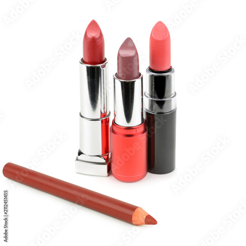 Three Different Lipsticks and Lip Liner Pencil on White Background Professional Lip Makeup Products Set with Diverse Lipstick Shades