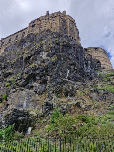 Edinburgh Castle on top of a rocky hill in Edinburgh, Scotland