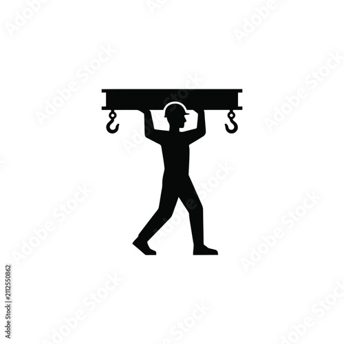 Obraz na plátně Worker carrying heavy beam with hooks black silhouette on a white background sil