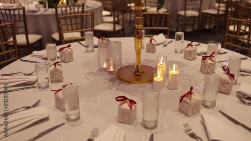 Served tables with decorations on a wedding