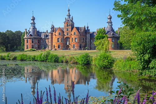 Ooidonk Castle / Kasteel van Ooidonk, 16th century Flemish Renaissance moated castle at Sint-Maria-Leerne in summer, Deinze, East Flanders, Belgium