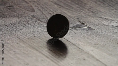 A single 2 euro coin spinning on its edge, representing chance and decision, capturing the uncertainty of a flip and the concept of heads or tails