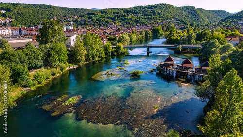 Cuadro en lienzo Aerial view of Bosanska Krupa town and turquoise Una river in Bosnia and Herzego