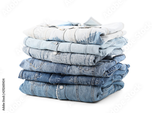 Stack of folded blue denim ...