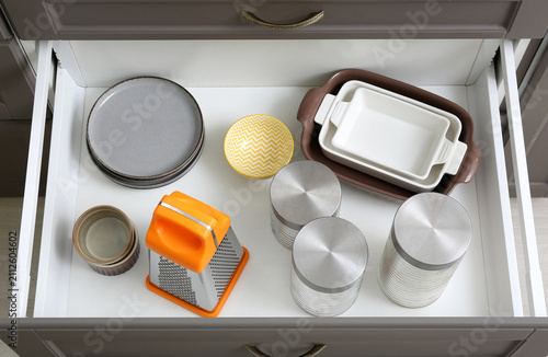 Open kitchen drawer with ne...