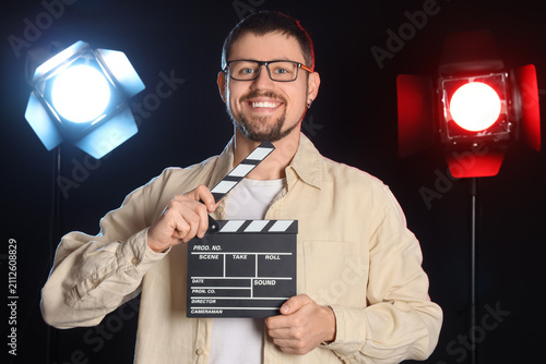 Male actor with movie clapp...