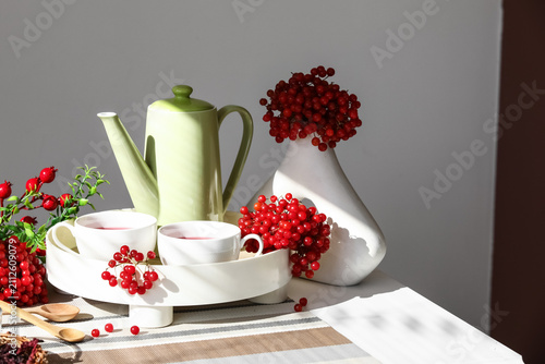 Teapot and cups of hot vibu...
