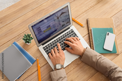Businessmans hands using la...