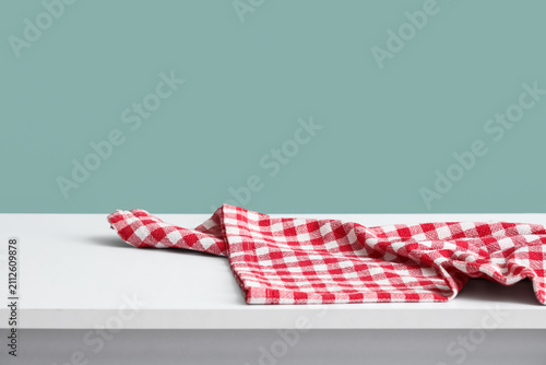 Red and white checkered kit...