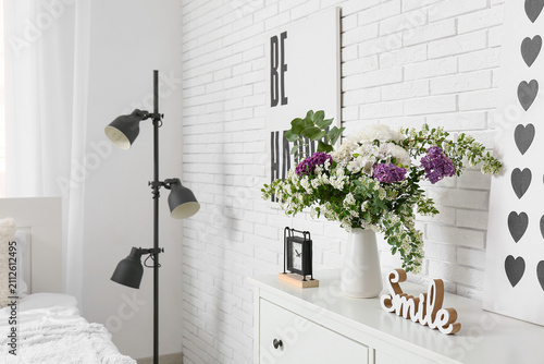 Clock and vase with beautif...