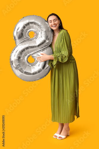 Happy young woman with silv...