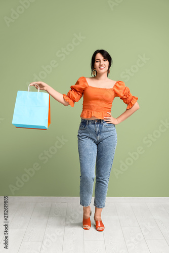 Beautiful happy woman with ...